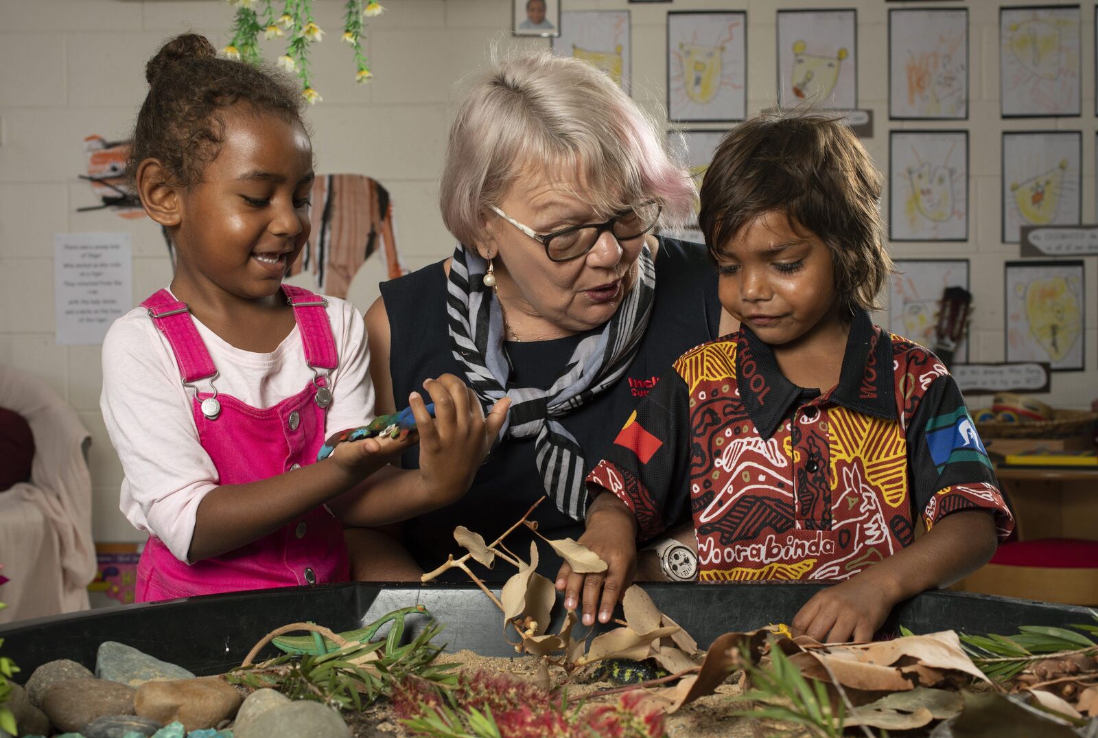 IP playing with children