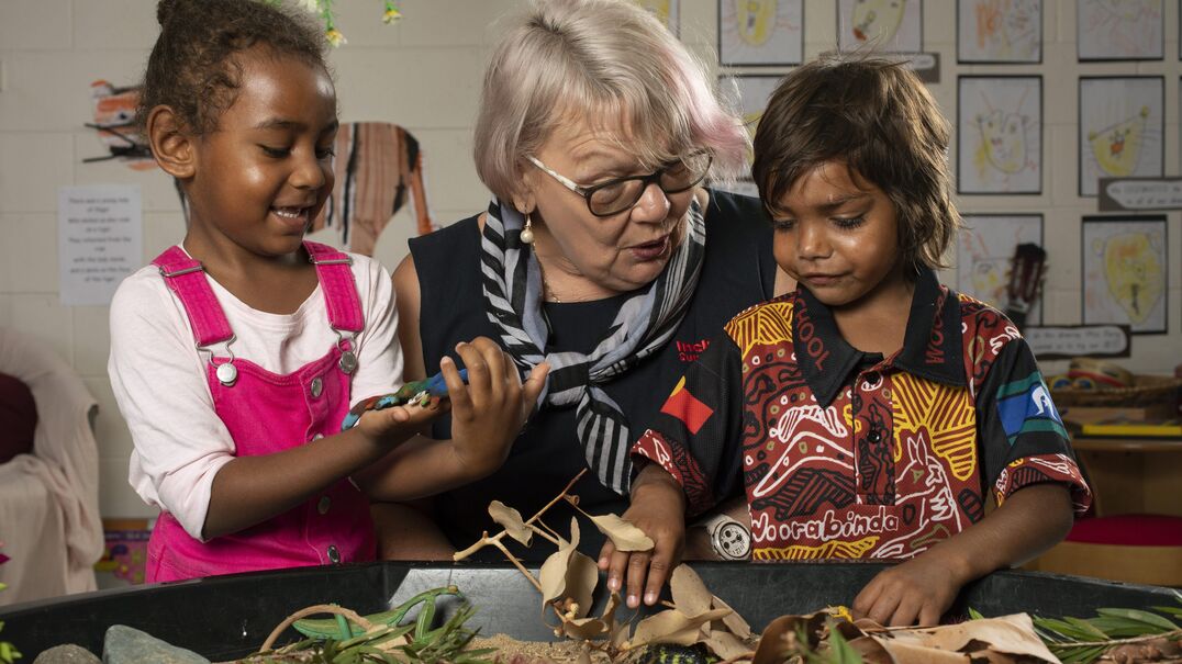 IP playing with children